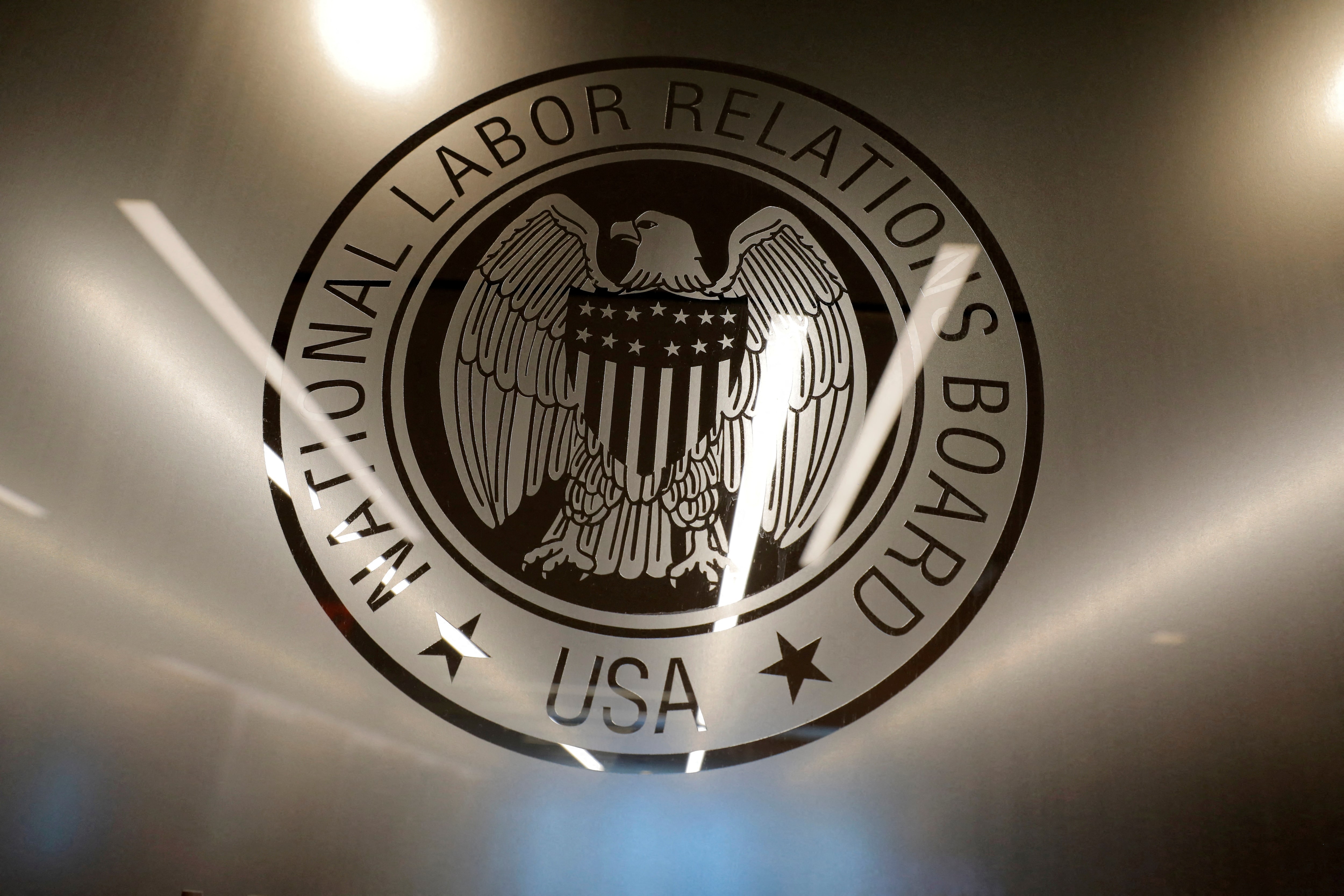 Department of Labor and SEC logos with cryptocurrency symbols